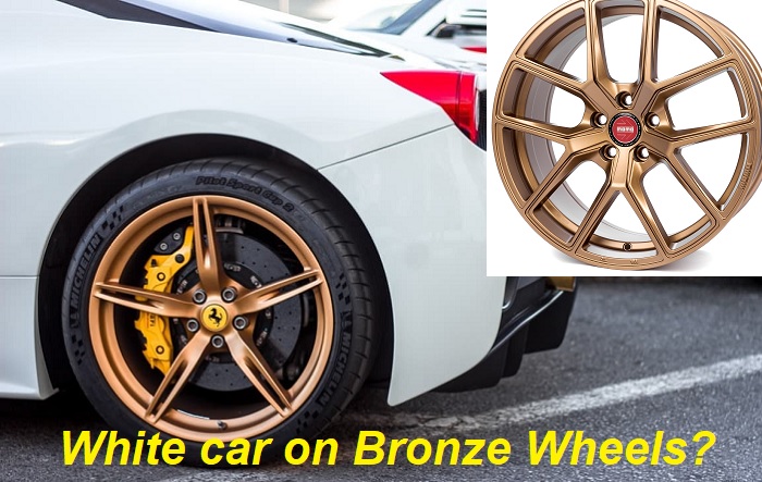 White car on bronze wheels